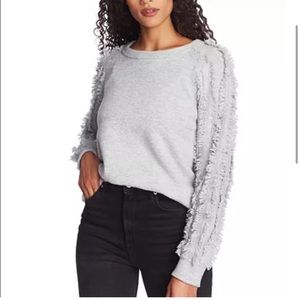 1. State - Fringe Sleeve Sweater